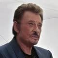 Cannes : Johnny Hallyday triomphe au haut des marches